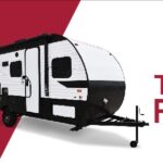 Banner promoting pay less vacation more, showcasing travel trailers for sale.