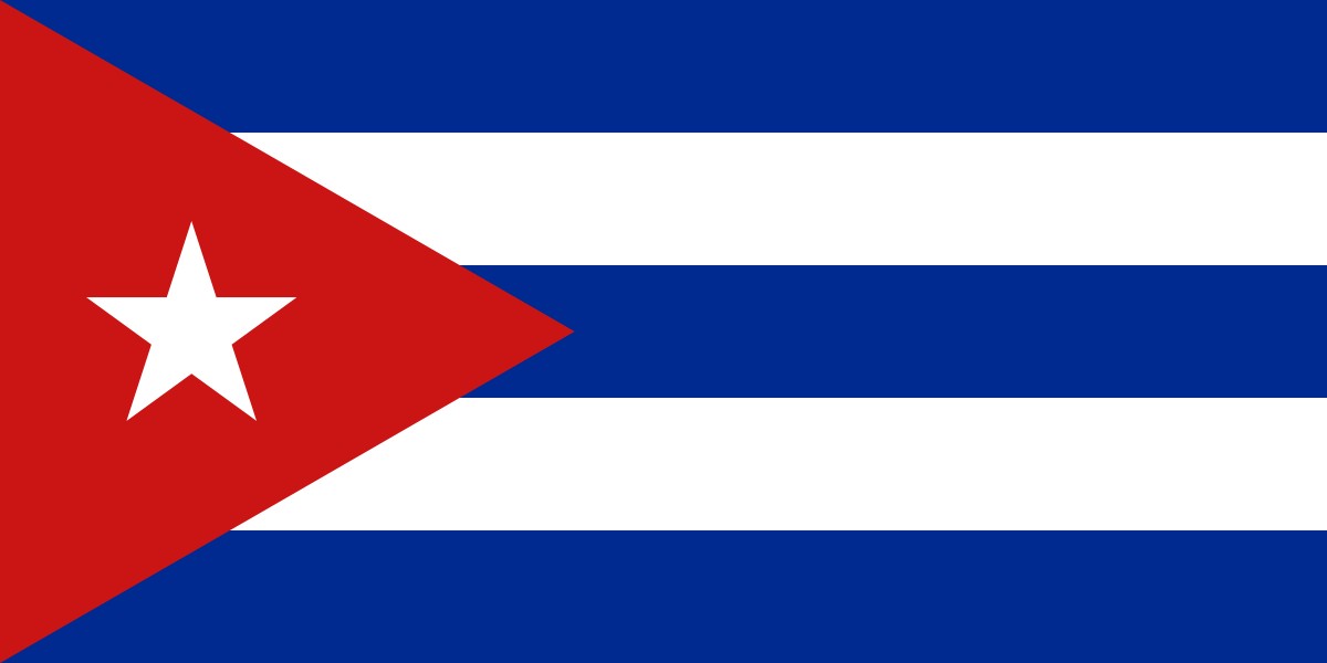 Cuban flag waving proudly against a blue sky