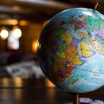 Globe on a wooden table, representing global travel destinations