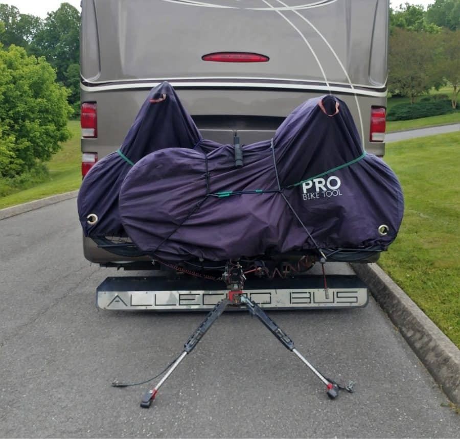 The Swagman bike rack setup ready for towing, positioned between the RV and tow car.