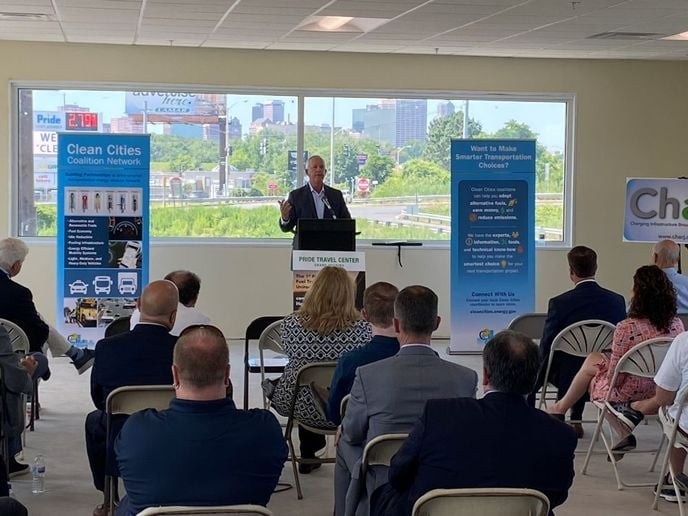 Tucker Perkins, president and CEO of PERC, addresses the crowd during a grand opening ceremony for the Pride Travel Center, highlighting the importance of propane autogas and other clean energy solutions for the future of transportation.