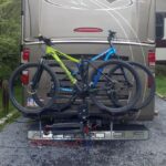 Bikes attached to the Swagman RV-Approved Bike Rack before cover installation and electrical cable setup.