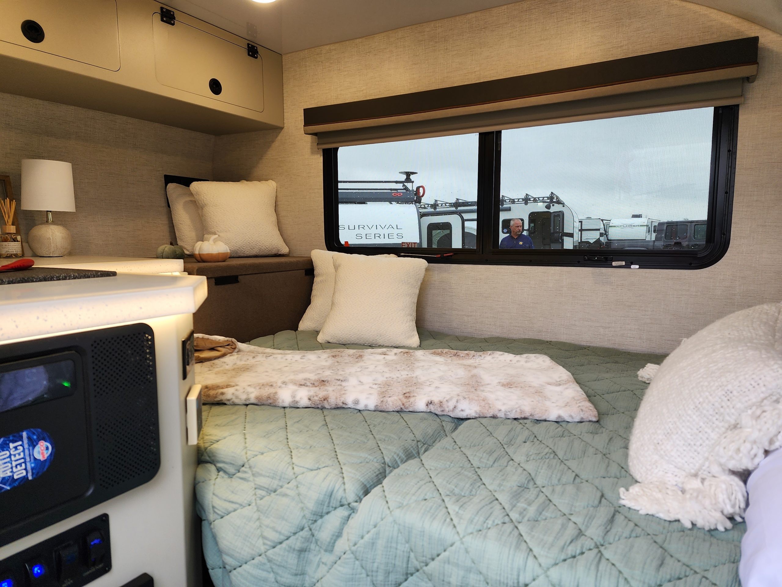 Another interior perspective of the Encore RV VENŪ 1500 lb travel trailer, emphasizing the spacious feel despite its small size.