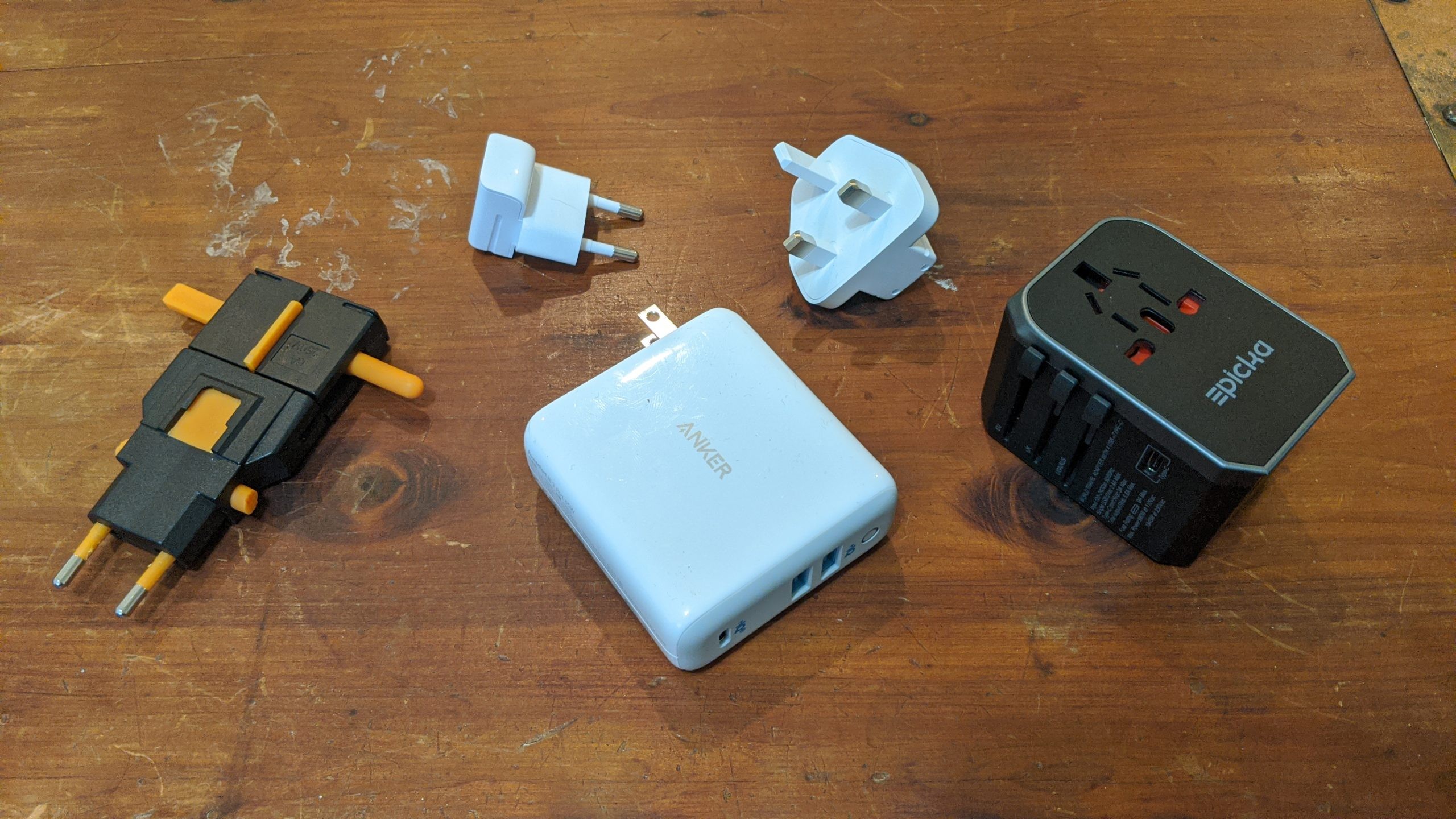 Variety of Universal Travel Adapters; Anker, EPICKA and Kikkerland