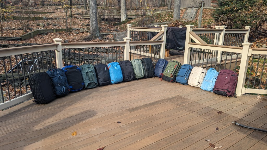 Comparing travel backpacks side-by-side during testing