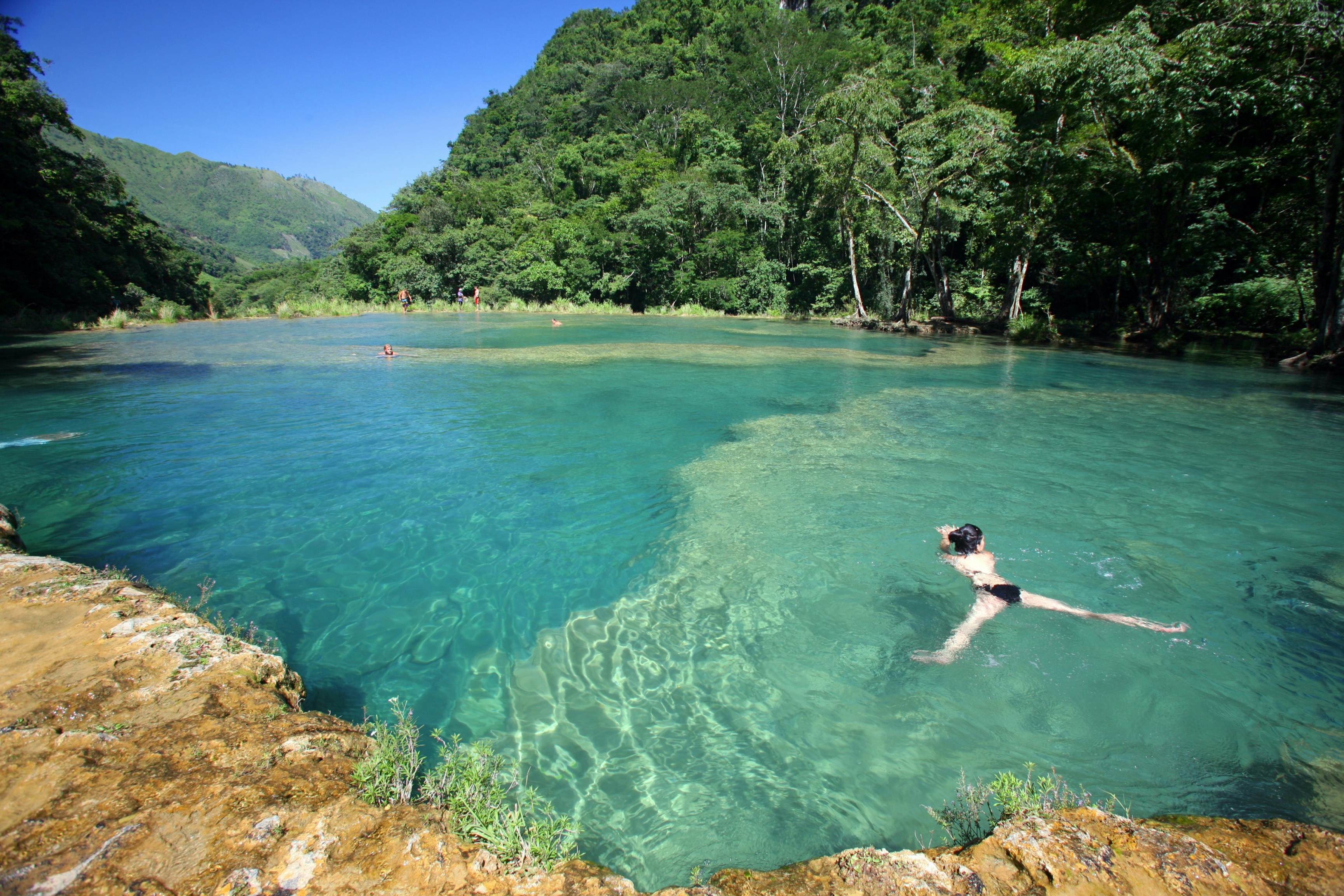 Visitors swimming at Semuc Champey