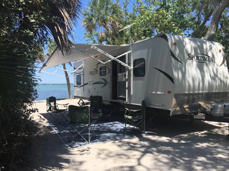 Clean interior of a Meacham's RV travel trailer rental, showcasing comfortable seating and well-maintained features.