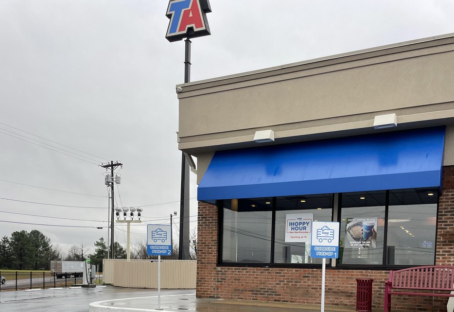 Upscale IHOP restaurant interior at Davy Crockett TA Travel Center, featuring modern decor and a trucker bar.