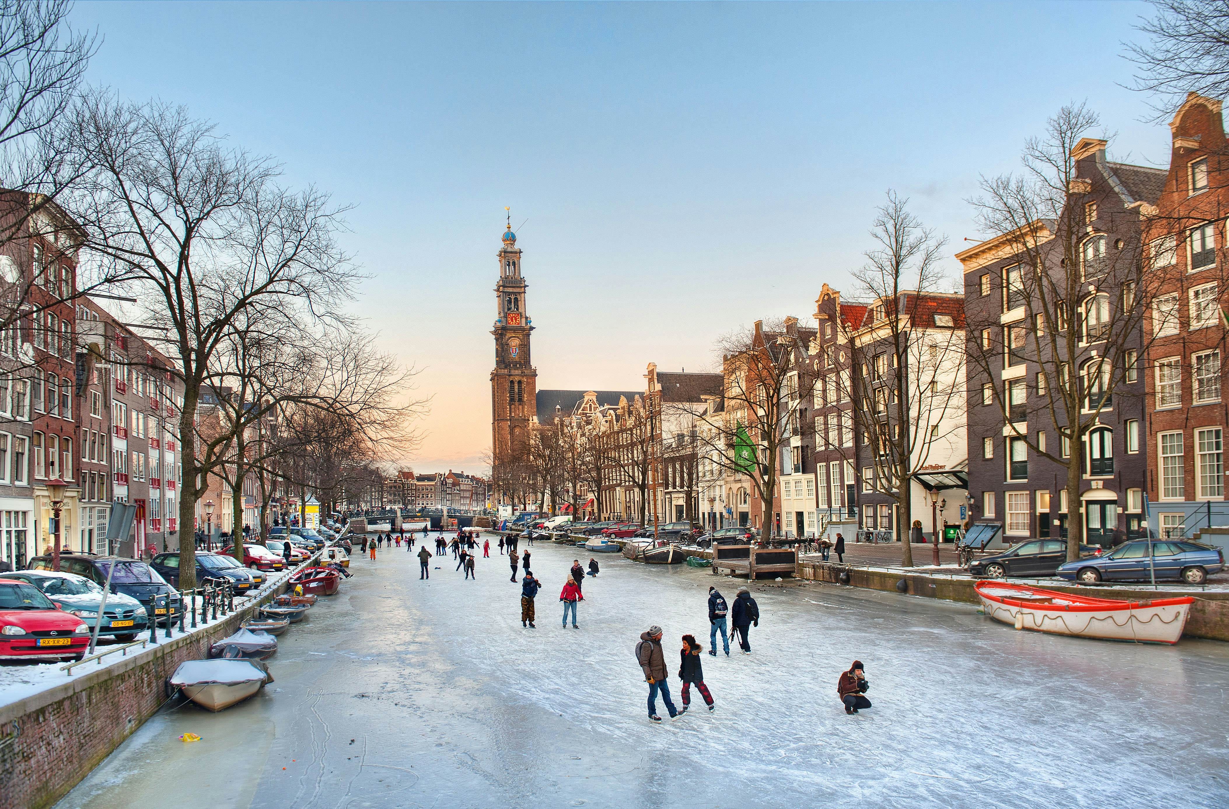 Skaters on the iced-over canals of Amsterdam, the Netherlands