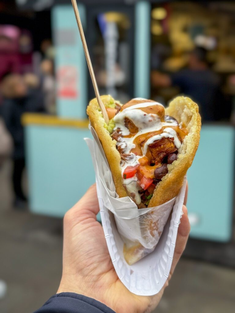 Venezuelan arepas from a food stall in Camden Market, filled with savory fillings