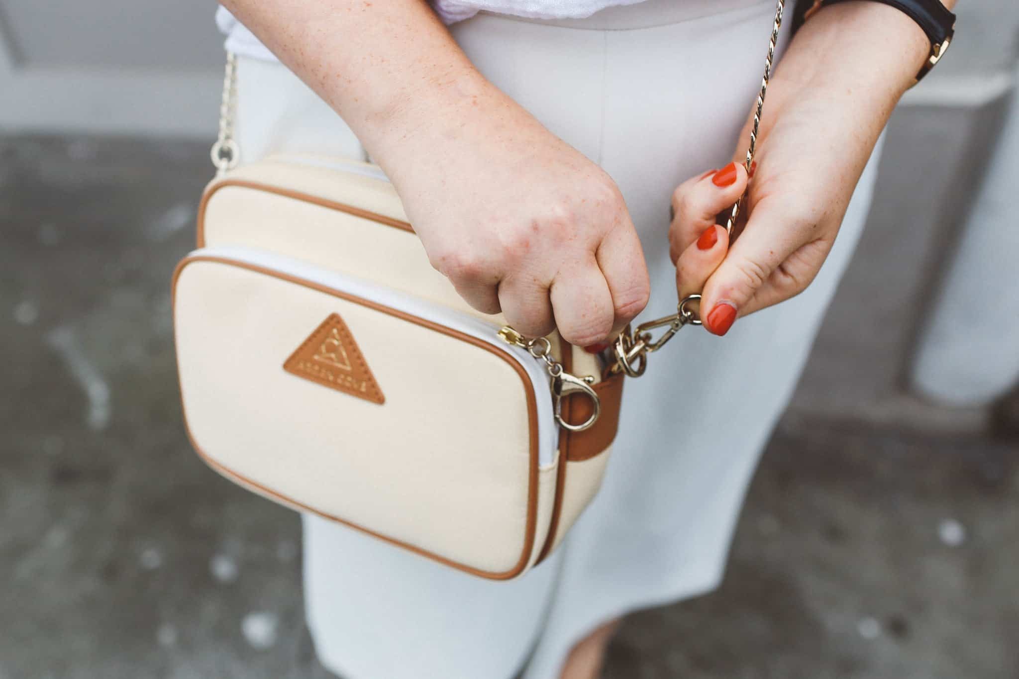 Unattractive berry colored anti-theft travel purse