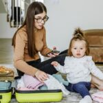 Baby sleeping safely in a travel crib