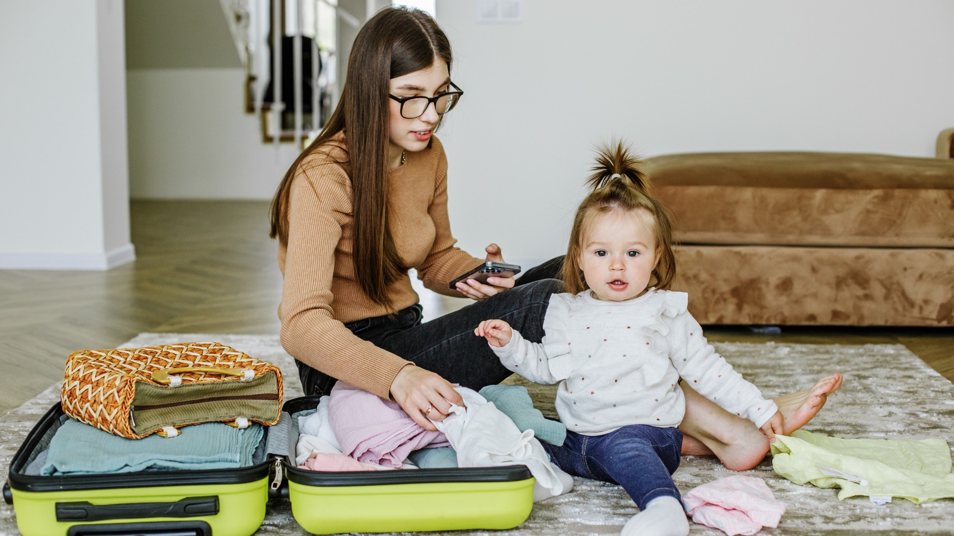 Baby sleeping safely in a travel crib