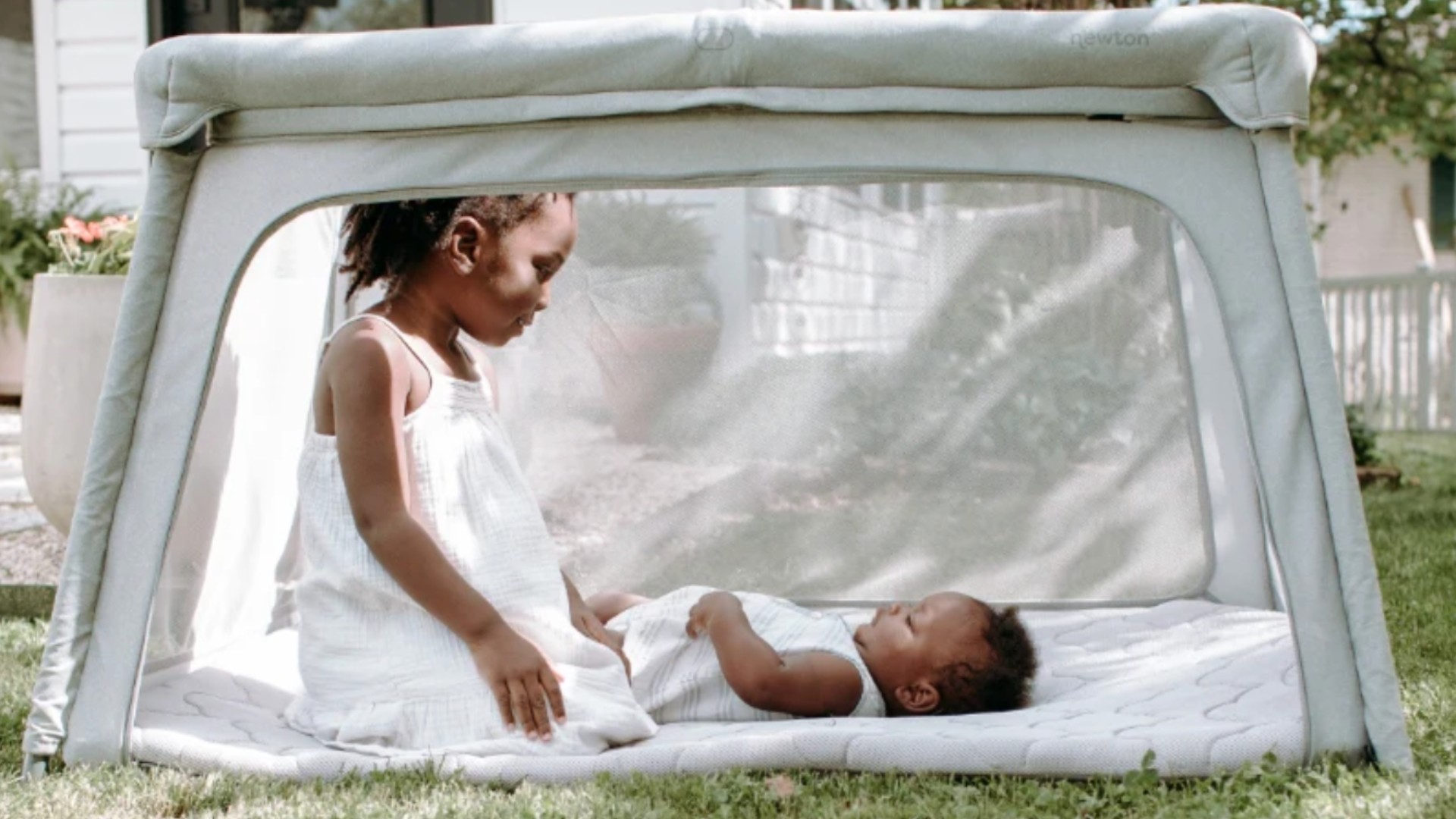 Baby in Travel Crib