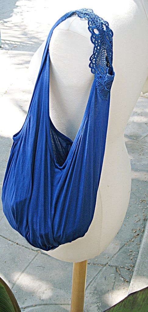 A blue beach bag made out of a tank top.