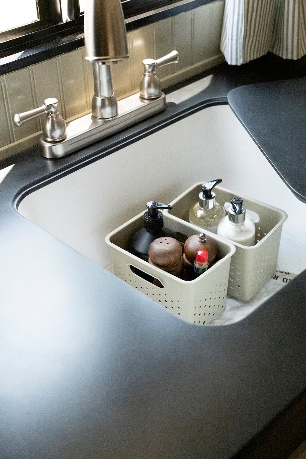 Camper kitchen sink with countertop cover for extra space