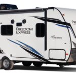 Exterior view of Coachmen Freedom Express Select 31SE two bedroom travel trailer