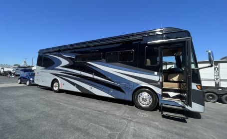 Image of a 2022 Class A Motor Home Tiffin Motorhomes Allegro RED 37 PA, available for RV rental near Joe's Travel Plaza.