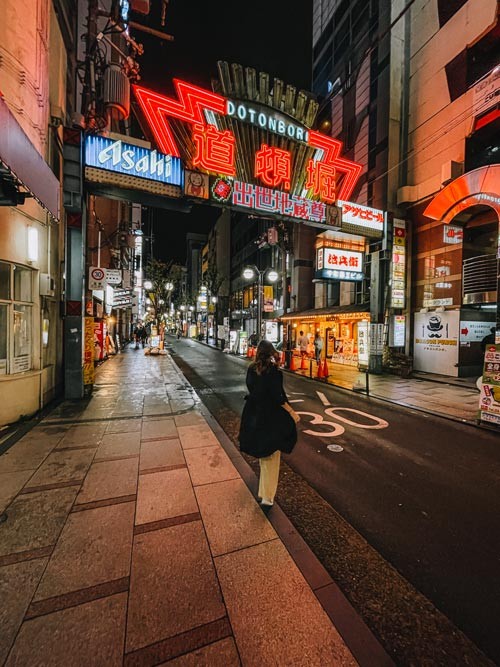 Dotonbori in Osaka at night, illuminated with vibrant neon signs