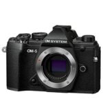 The OM System OM-5 mirrorless camera is showcased against a clean white backdrop, highlighting its compact design.