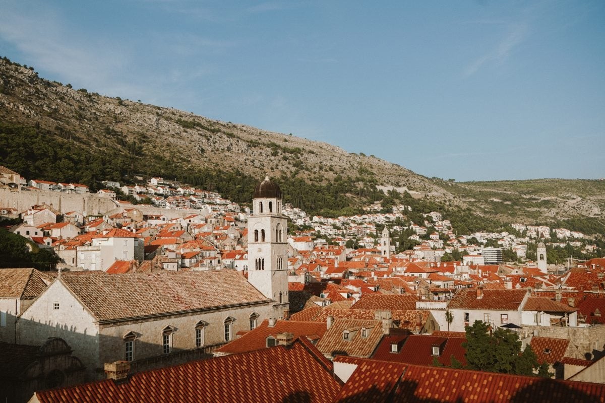 Charming street scene in Dubrovnik's Old Town, showcasing the historic architecture and inviting atmosphere, a highlight of any Croatia travel itinerary.