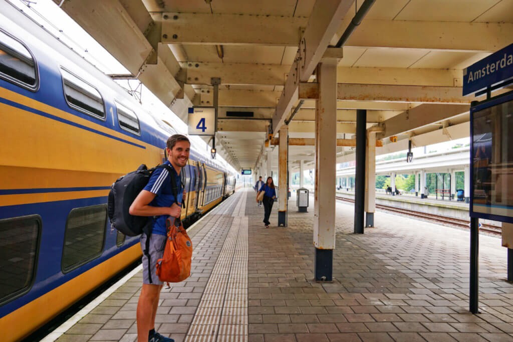 Best backpacks for traveling Europe: author and backpack in Amsterdam