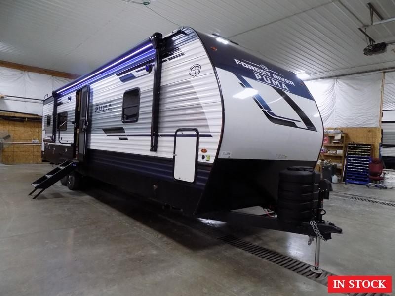 Puma 30RKQS Travel Trailer displaying rear kitchen design