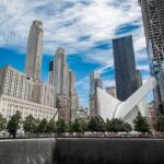 9/11 Memorial pools reflecting the sky, New York City