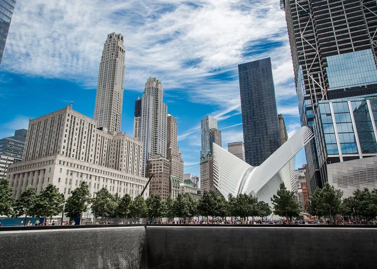 9/11 Memorial pools reflecting the sky, New York City