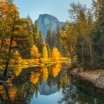 Half Dome reflected in the Merced River in Yosemite National Park during fall