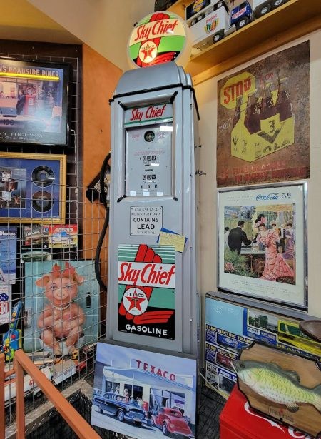 A restored vintage gas pump, a nostalgic symbol of roadside Americana