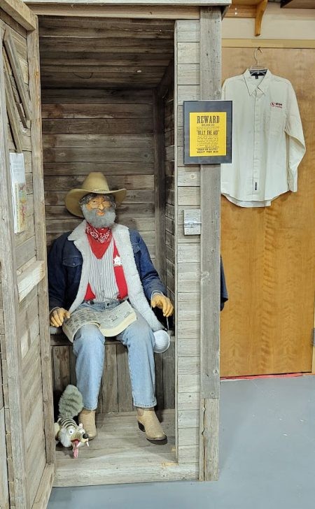 A seated &quot;old geezer&quot; figure, a humorous and unexpected museum exhibit