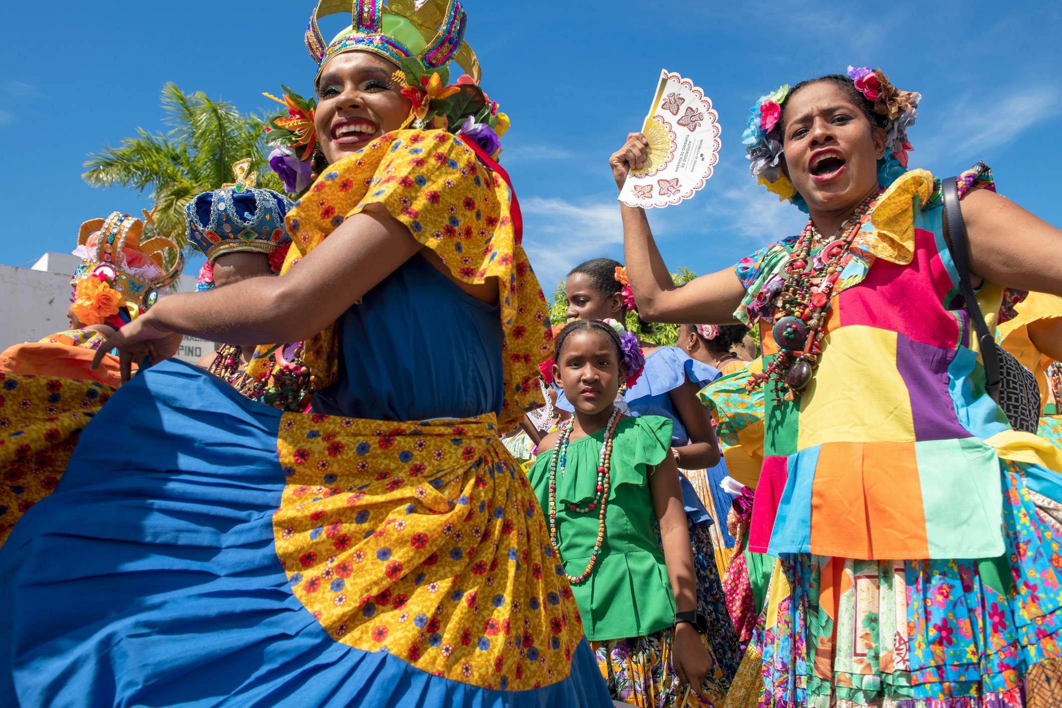 Participants in the 1000 Polleras Parade, showcasing Panama's rich cultural heritage during festival seasons, a draw for tourists.