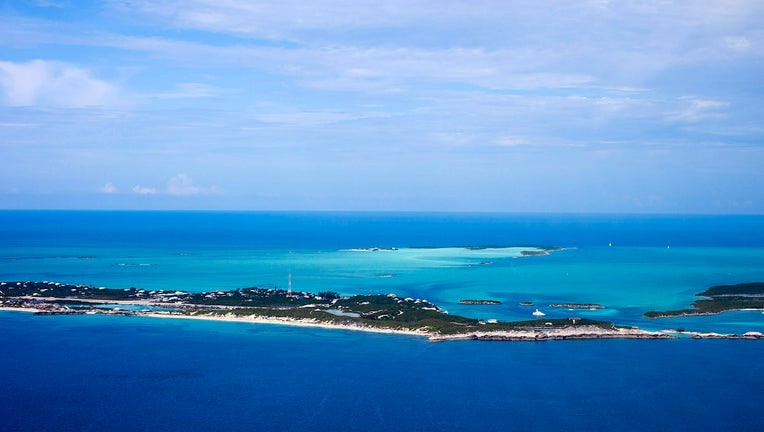 Aerial view of Exumas, Bahamas, highlighting the turquoise waters, relevant to travel and paradise imagery but contrasting with safety concerns.