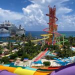 Cruise ships docked in the Bahamas, symbolizing popular resort destinations for Travel Tuesday deals.