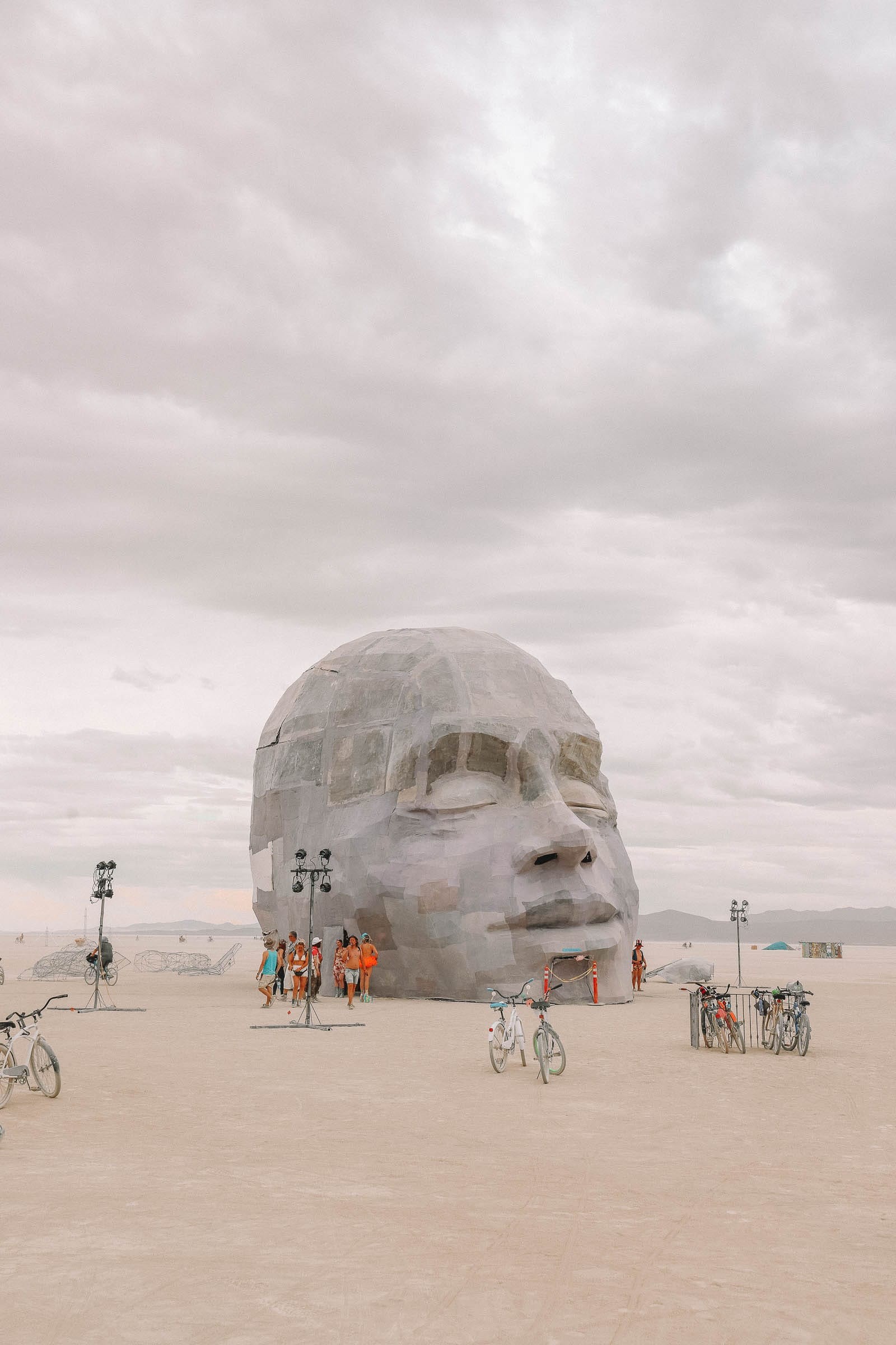 A participant in goggles and dust mask at Burning Man, prepared for the desert conditions of nevada travel destinations