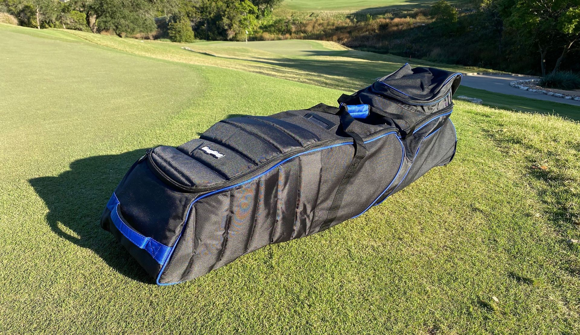 BagBoy T-660 Travel Cover standing on grass, highlighting its lightweight and airline-friendly design