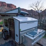 The Hiker Trailer exterior included solar panels and a Rhino Rack awning system, enhancing its off-grid capabilities.