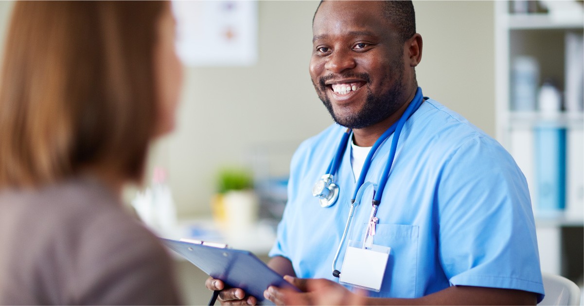 travel nurse working with a patient