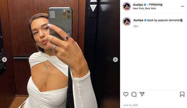 Dua Lipa in an elevator in New York City, maskless, July 2020