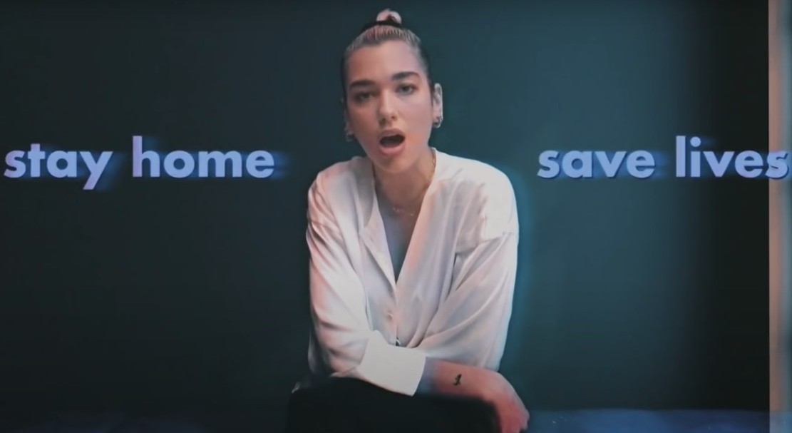 Dua Lipa performing &quot;Break My Heart&quot; virtually on Fallon, urging viewers to stay home and save lives