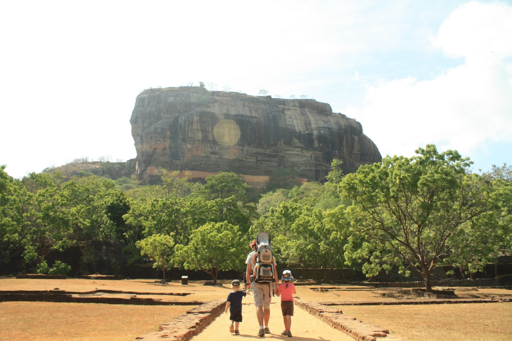 Family in front of ancient ruins