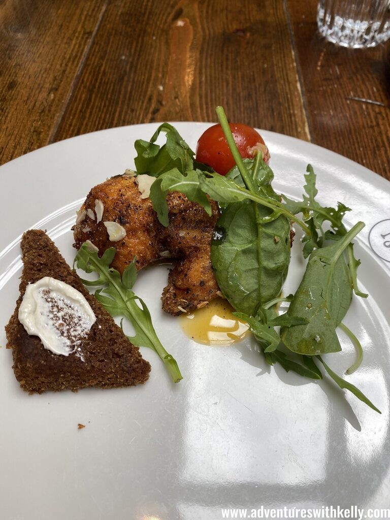 Indulging in flavorful Icelandic fish and chips on the food tour.