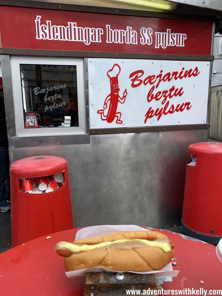 Enjoying Icelandic pancakes, a sweet treat during the food walk.