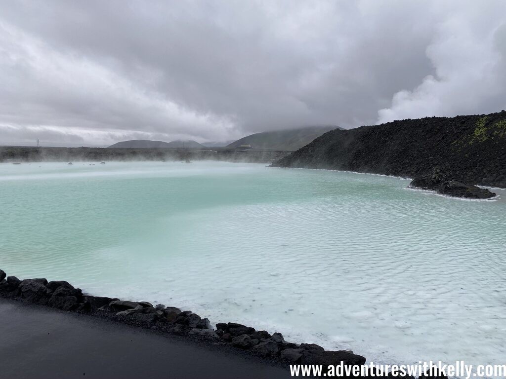 Sipping drinks while soaking in the Blue Lagoon's warm waters.