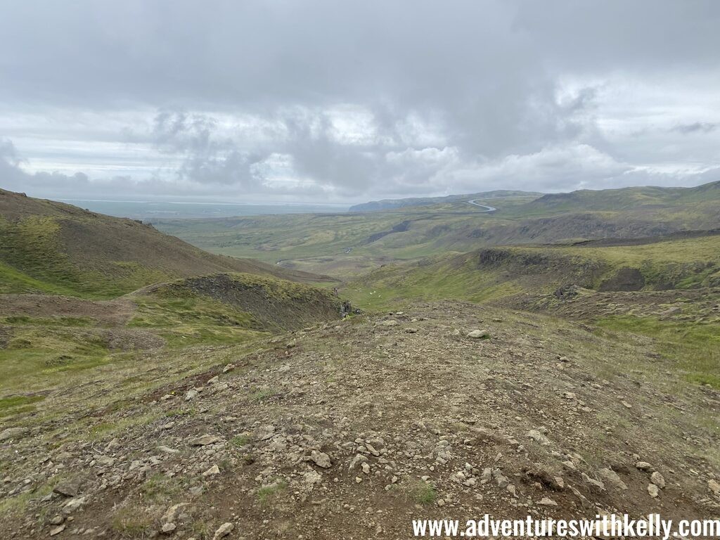 Steaming hot springs and mud pools along the Reykjadalur hiking trail.