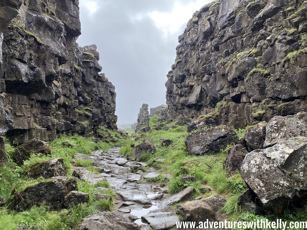 Walking through the tectonic plates at Þingvellir National Park.