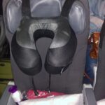 Cabeau Evolution S3 Travel Pillow on airplane seat headrest