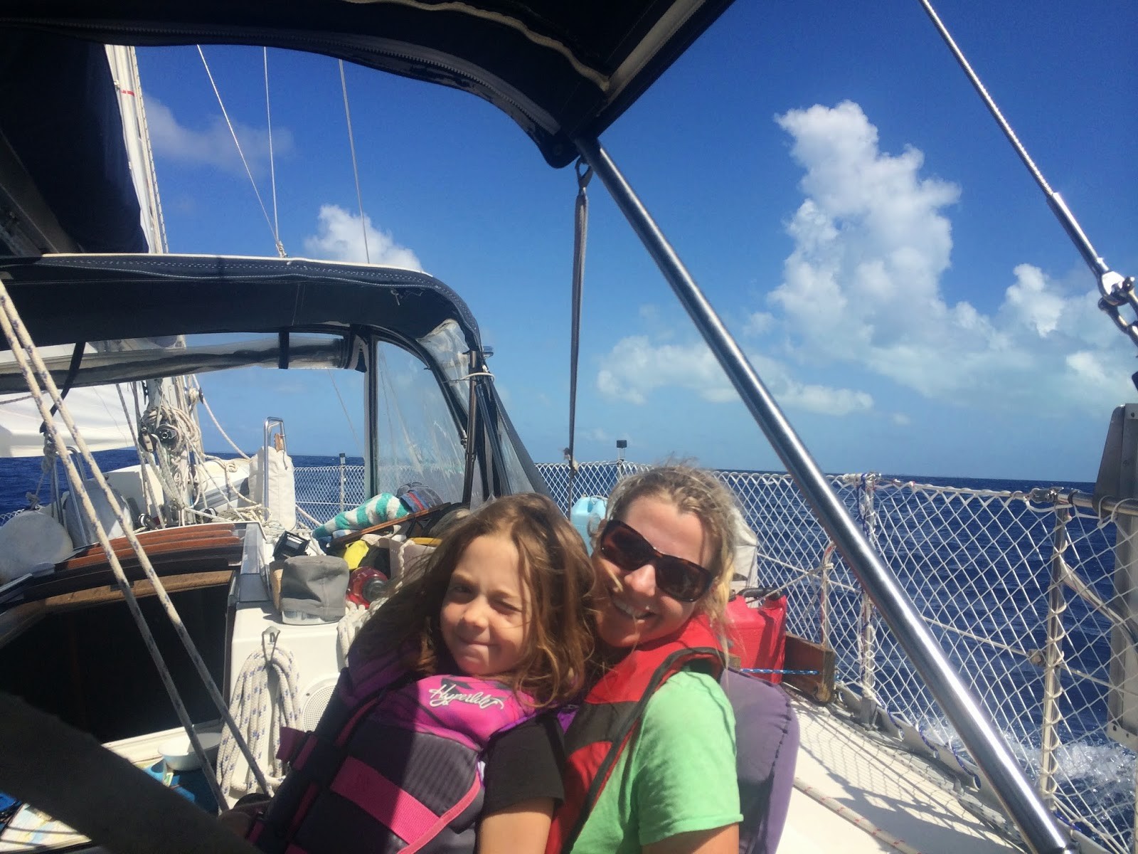 Family on a boat during their sabbatical