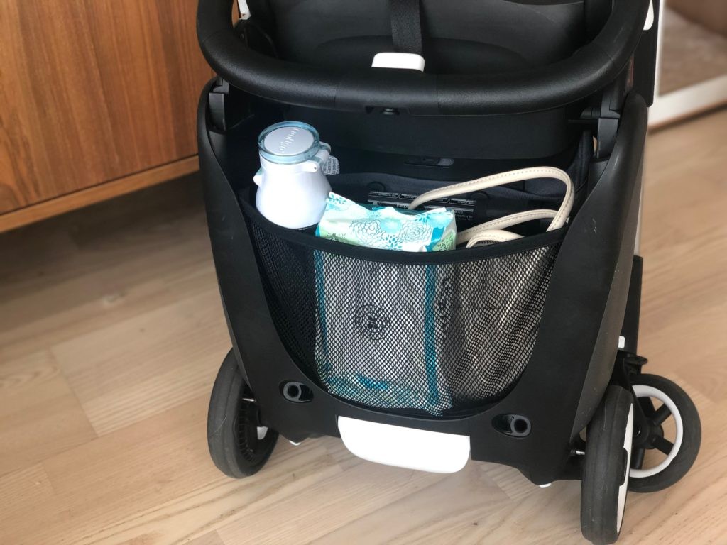 Toddler sitting in the Bugaboo Ant stroller, showing the seat size